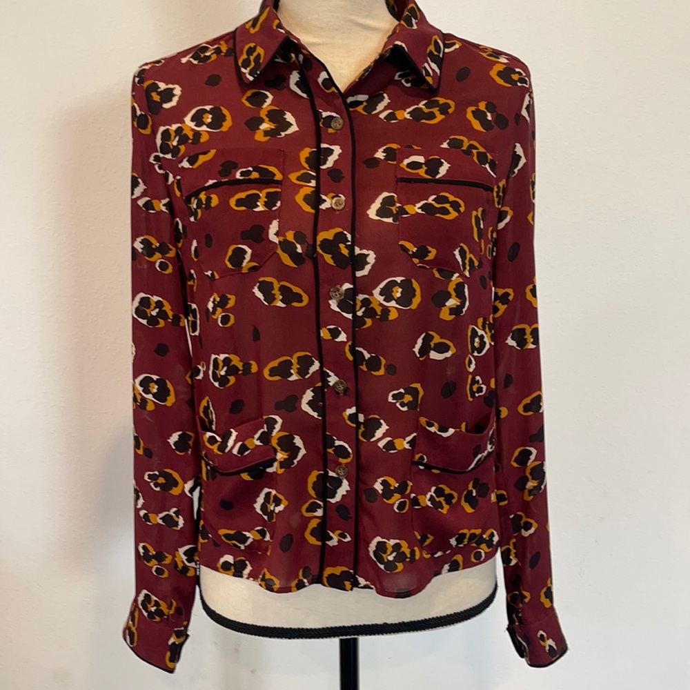 The Korner burgundy black animal print button down collared blouse shirt top